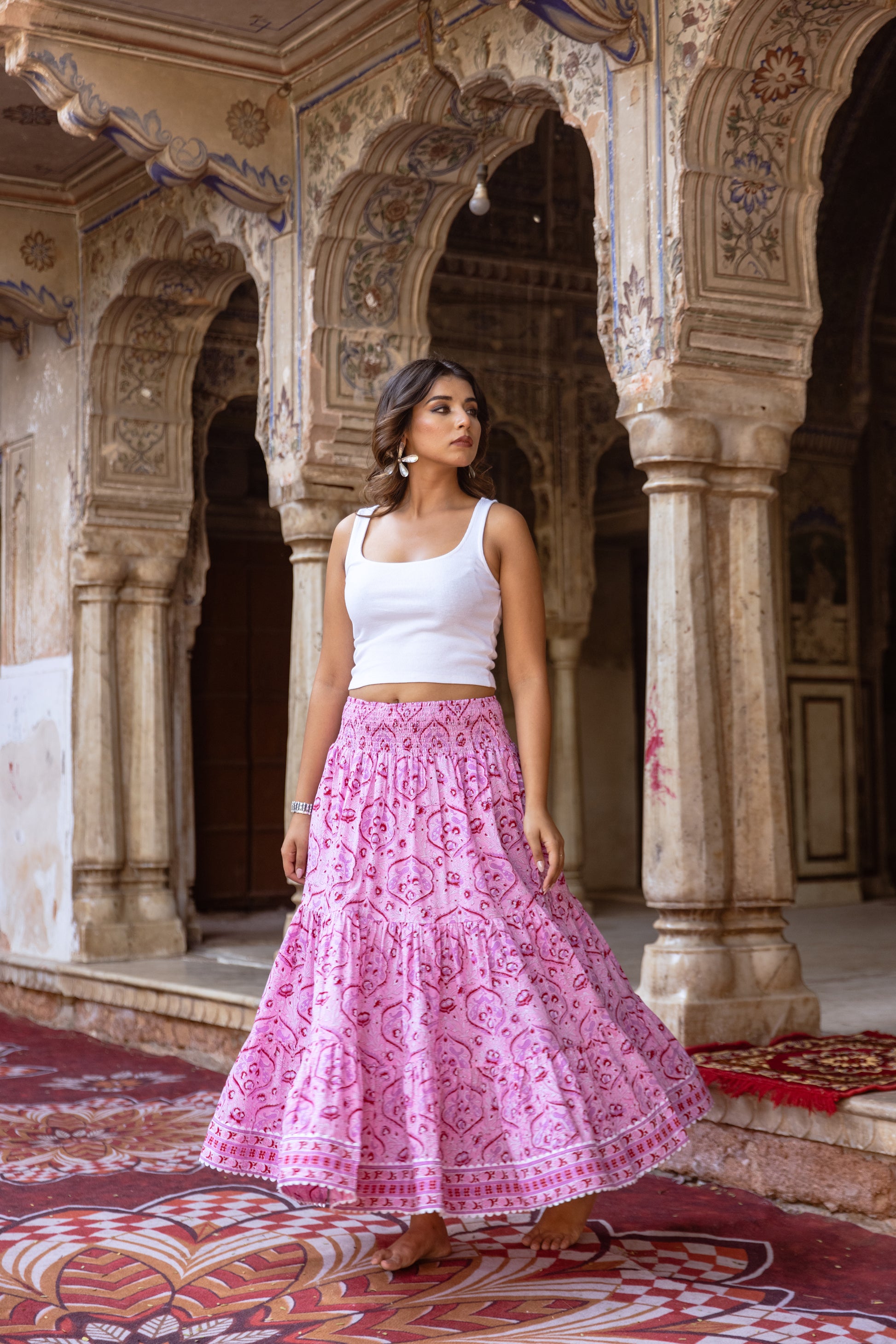 Side view of pink floral summer skirt with soft movement