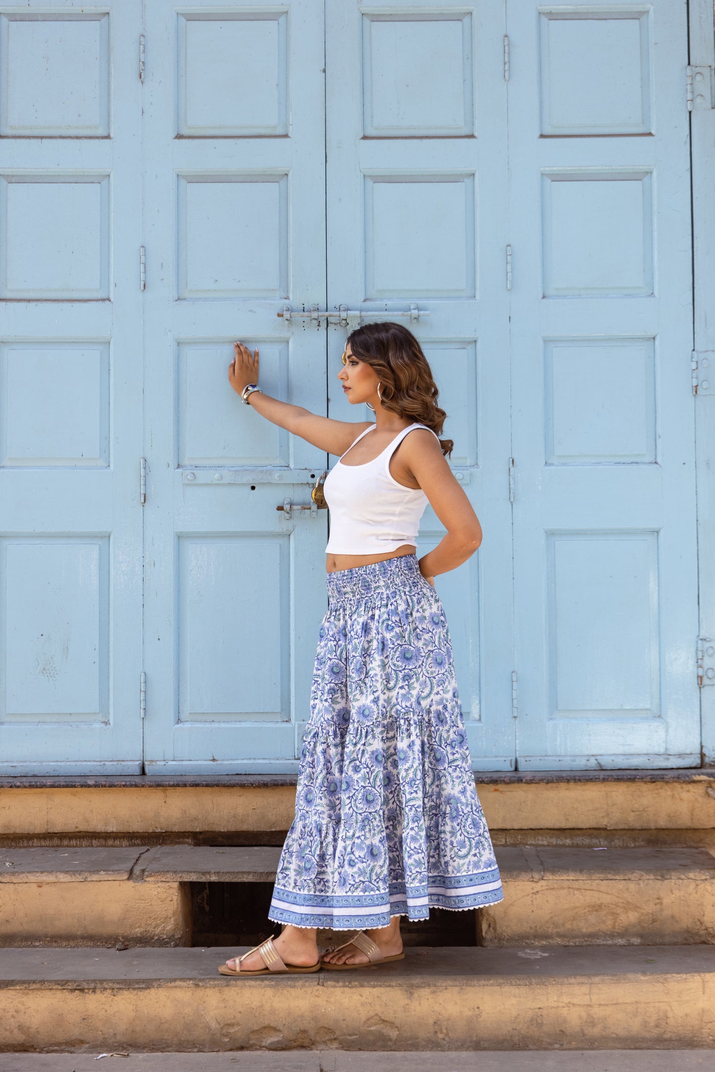 Side view of azure blue cotton maxi skirt for women