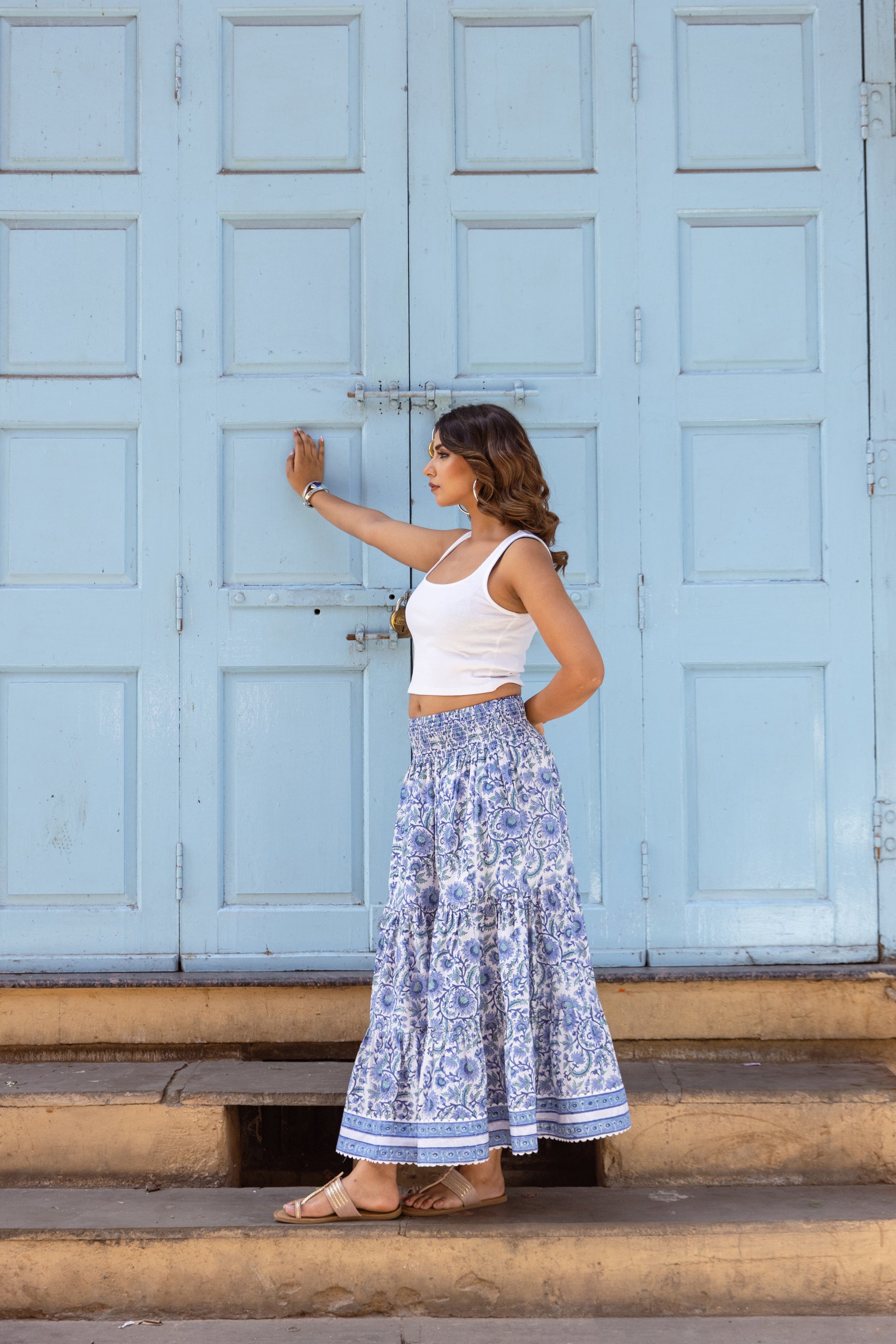 Side view of azure blue cotton maxi skirt for women