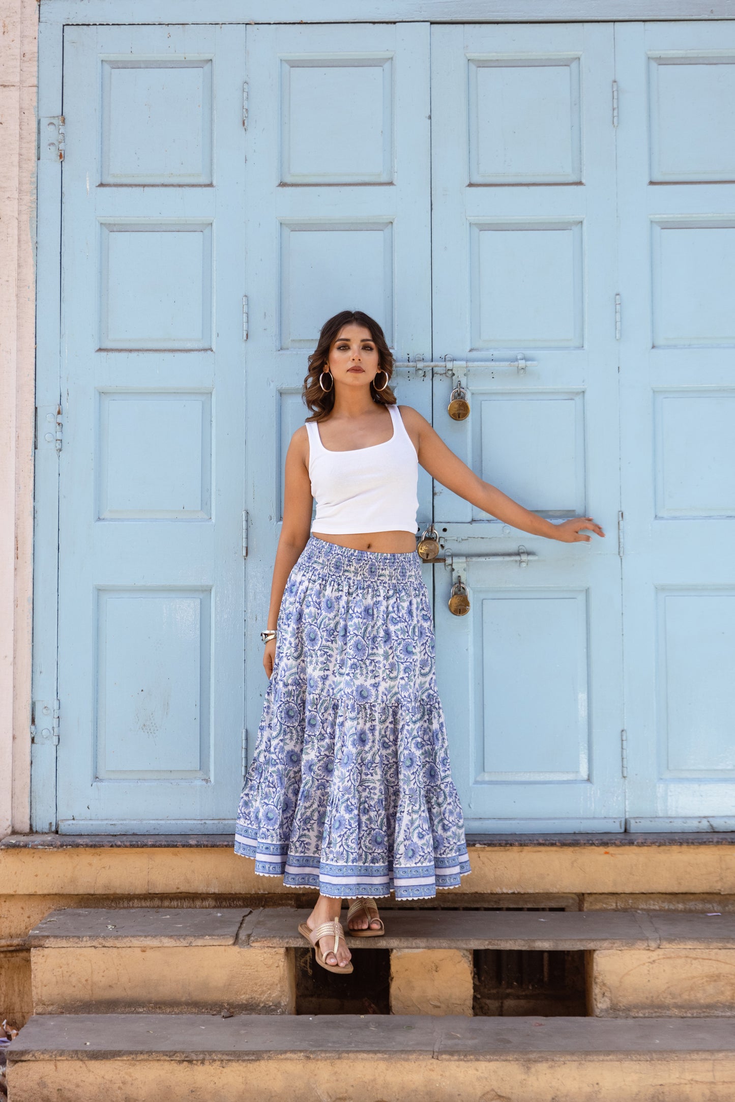 Full-length front view of blue floral cotton maxi skirt