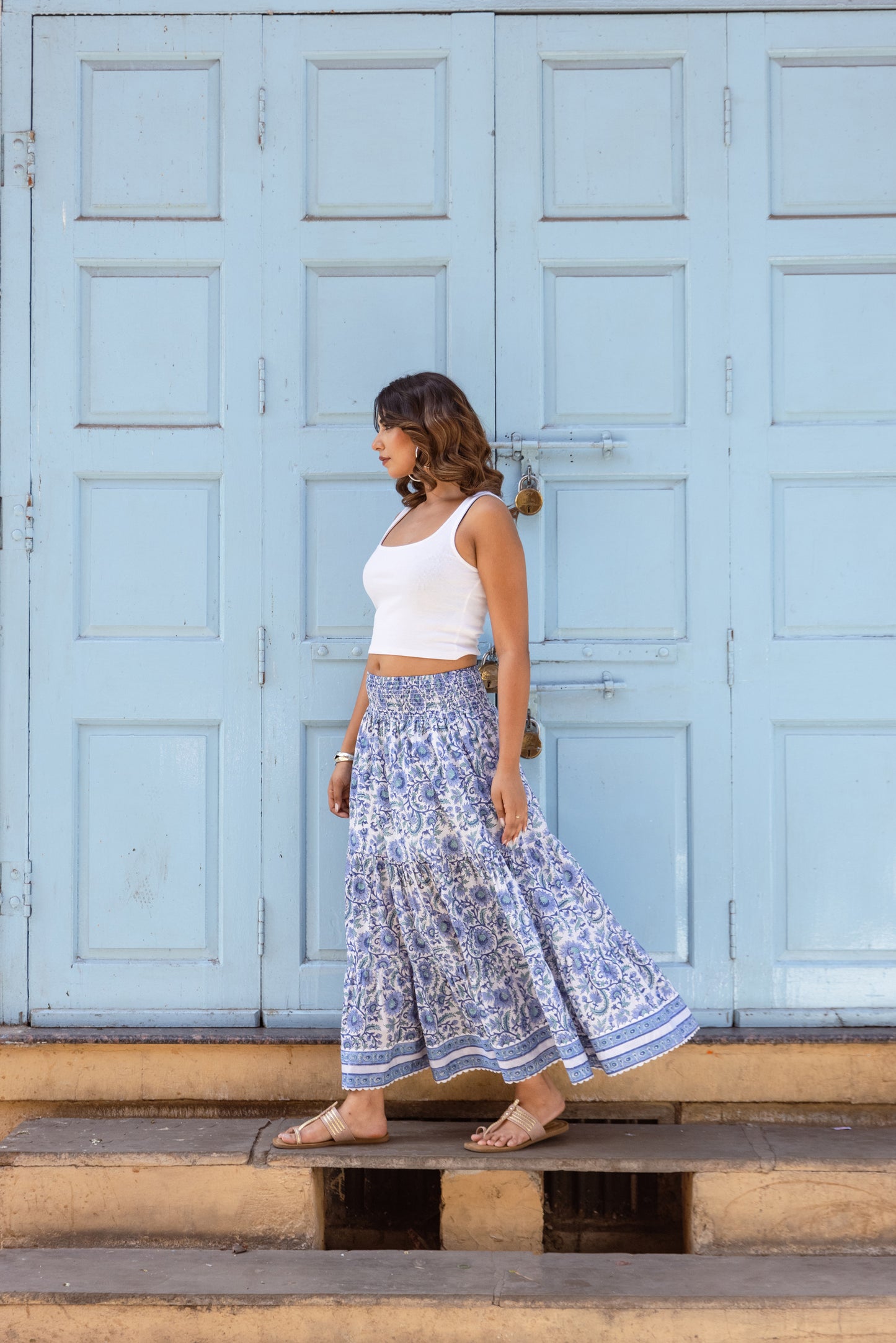 Long cotton skirt in azure blue with soft tiered shape