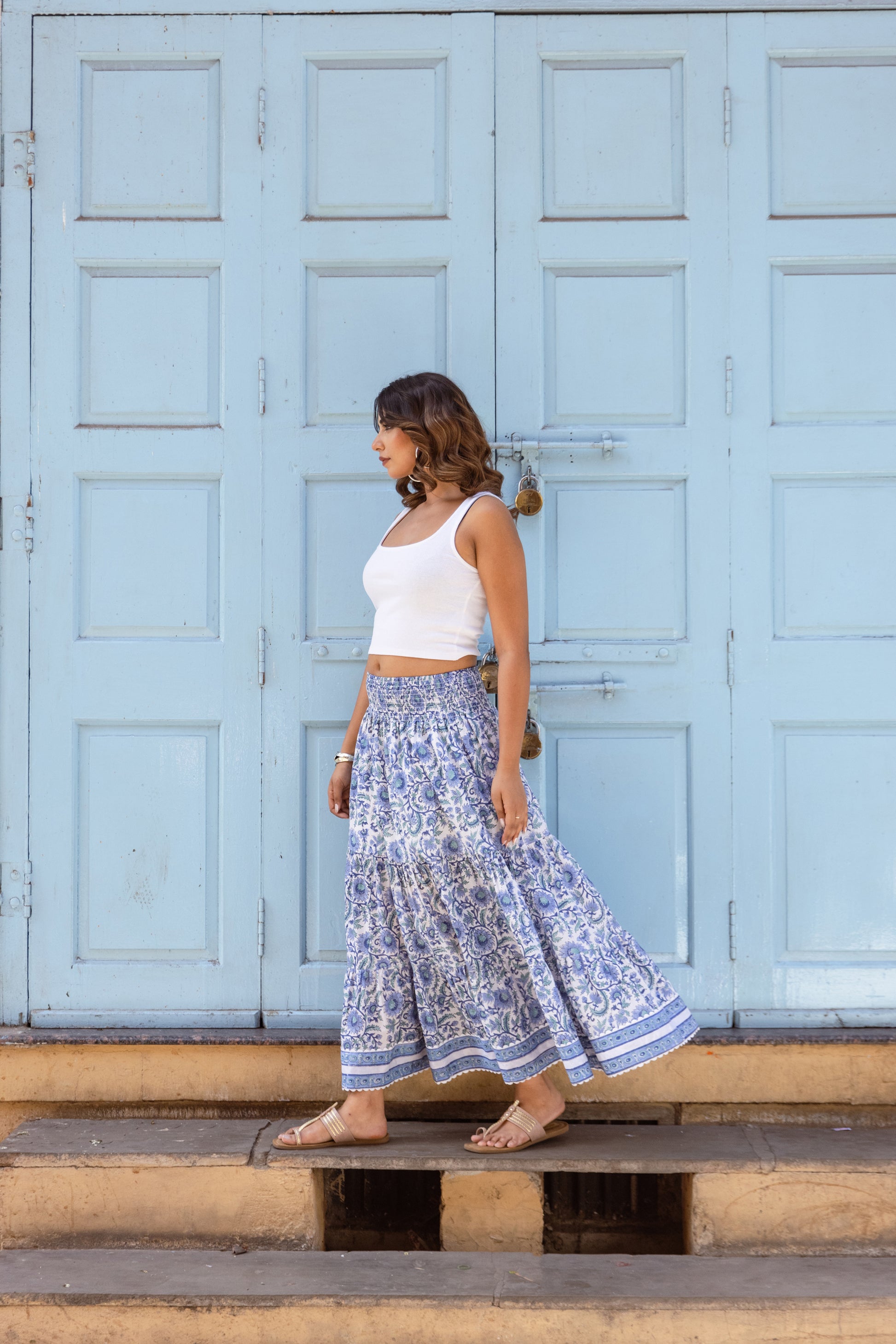 Long cotton skirt in azure blue with soft tiered shape
