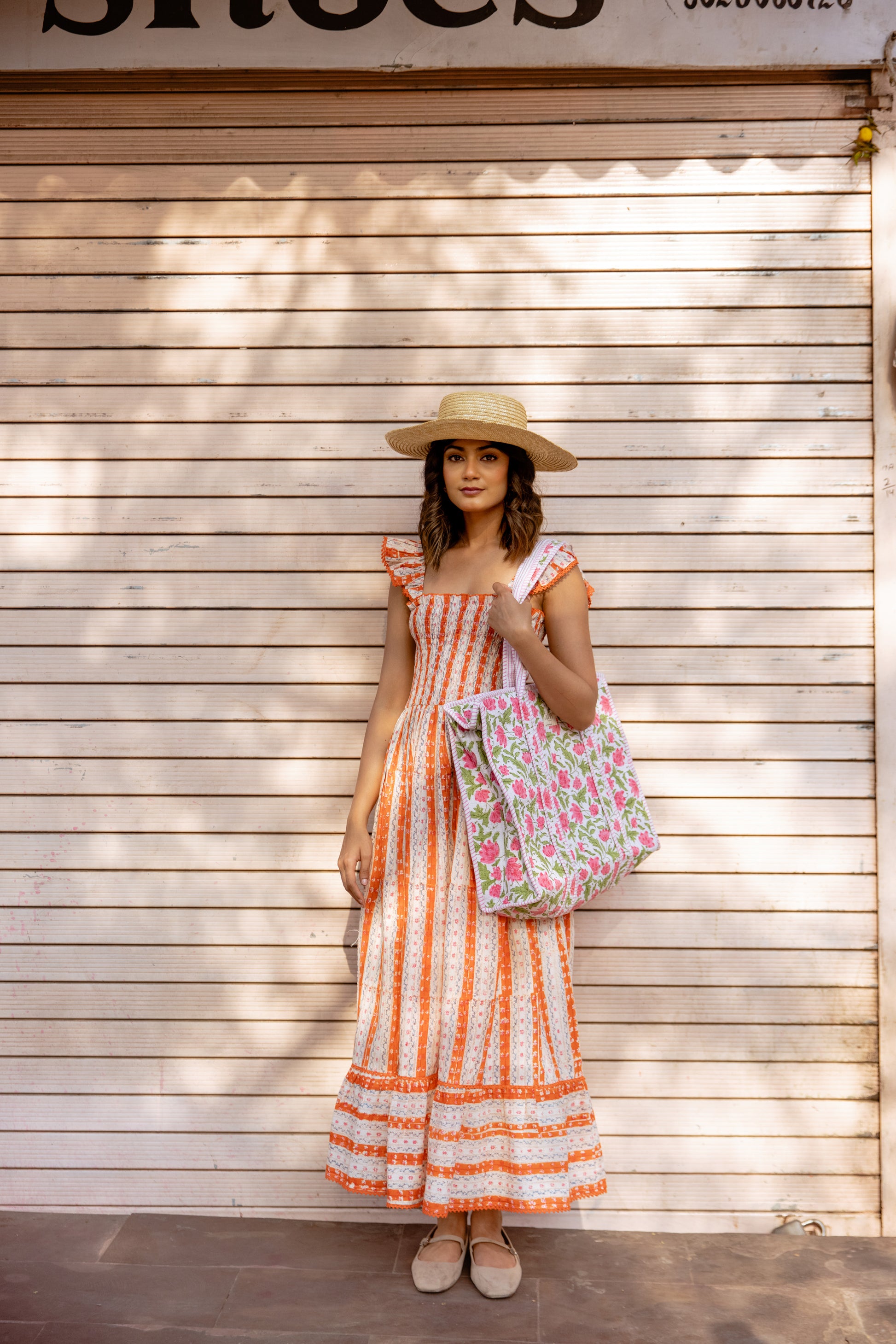THE SIENNA SMOCKED DRESS IN ORANGE BLOSSOM THE SIENNA SMOCKED DRESS IN ORANGE BLOSSOM