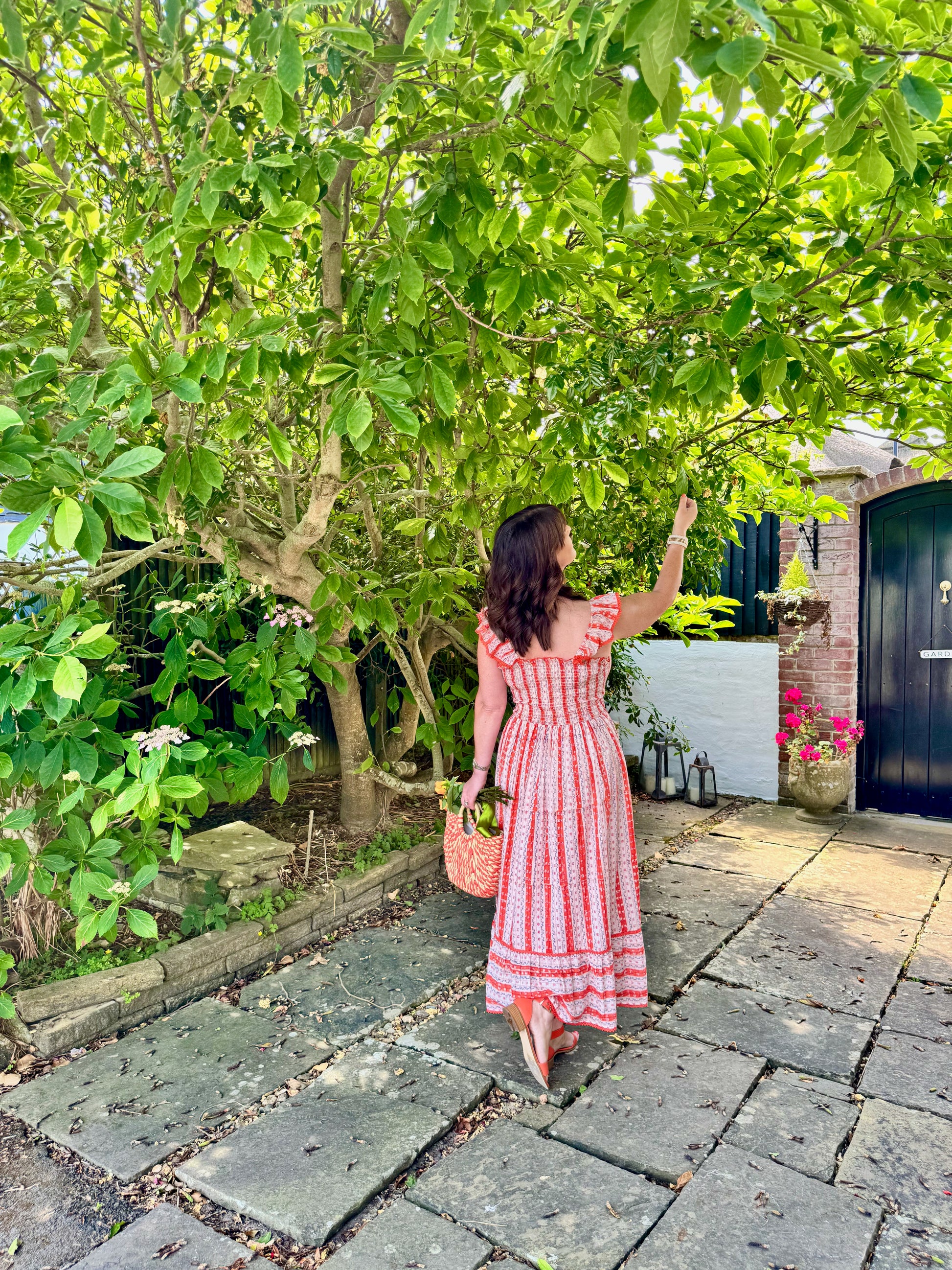SIENNA SMOCKED MIDI DRESS IN ORANGE BLOSSOM | Rooh London SIENNA SMOCKED MIDI DRESS IN ORANGE BLOSSOM | Rooh London