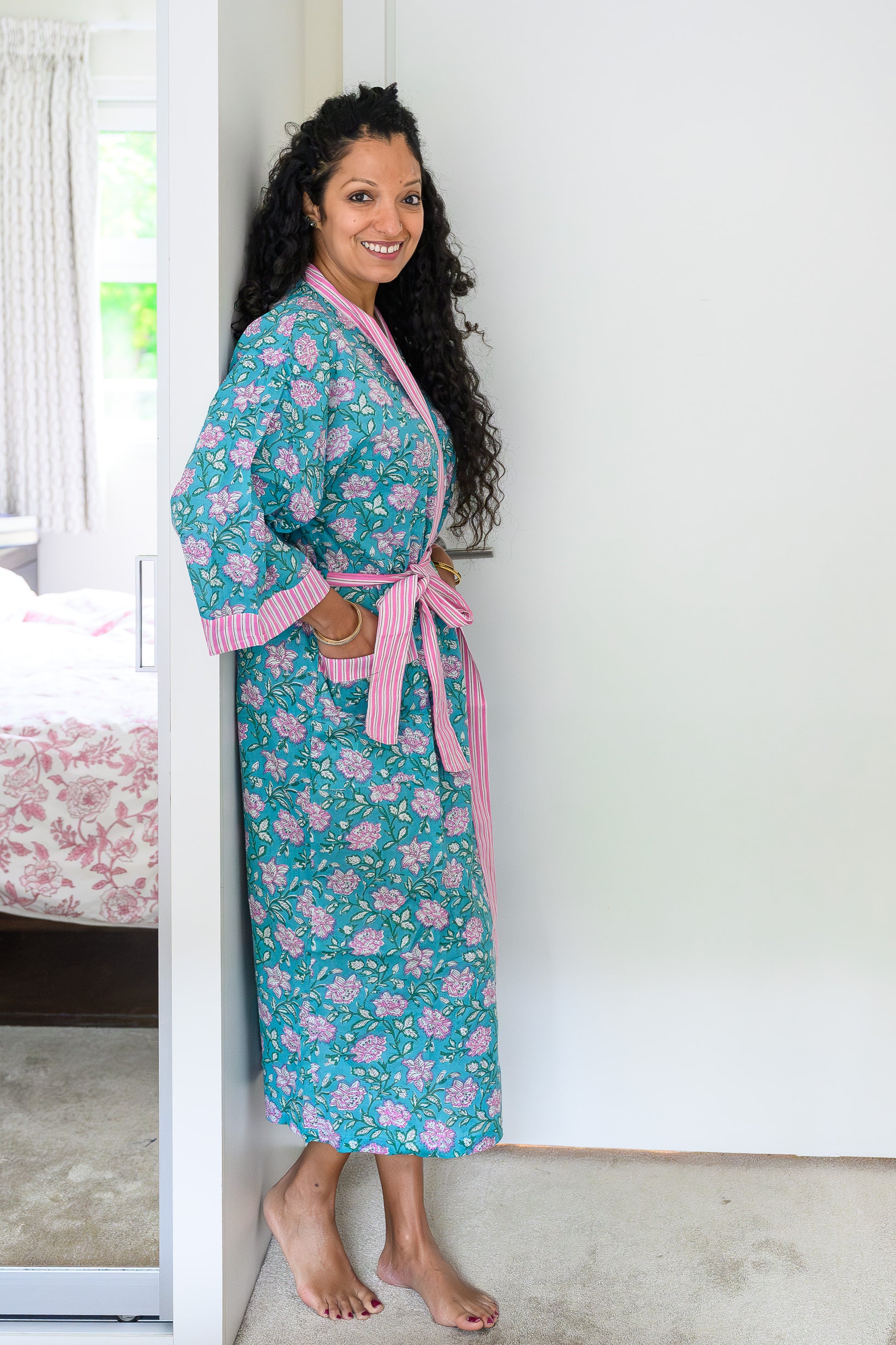 Side view of teal floral robe