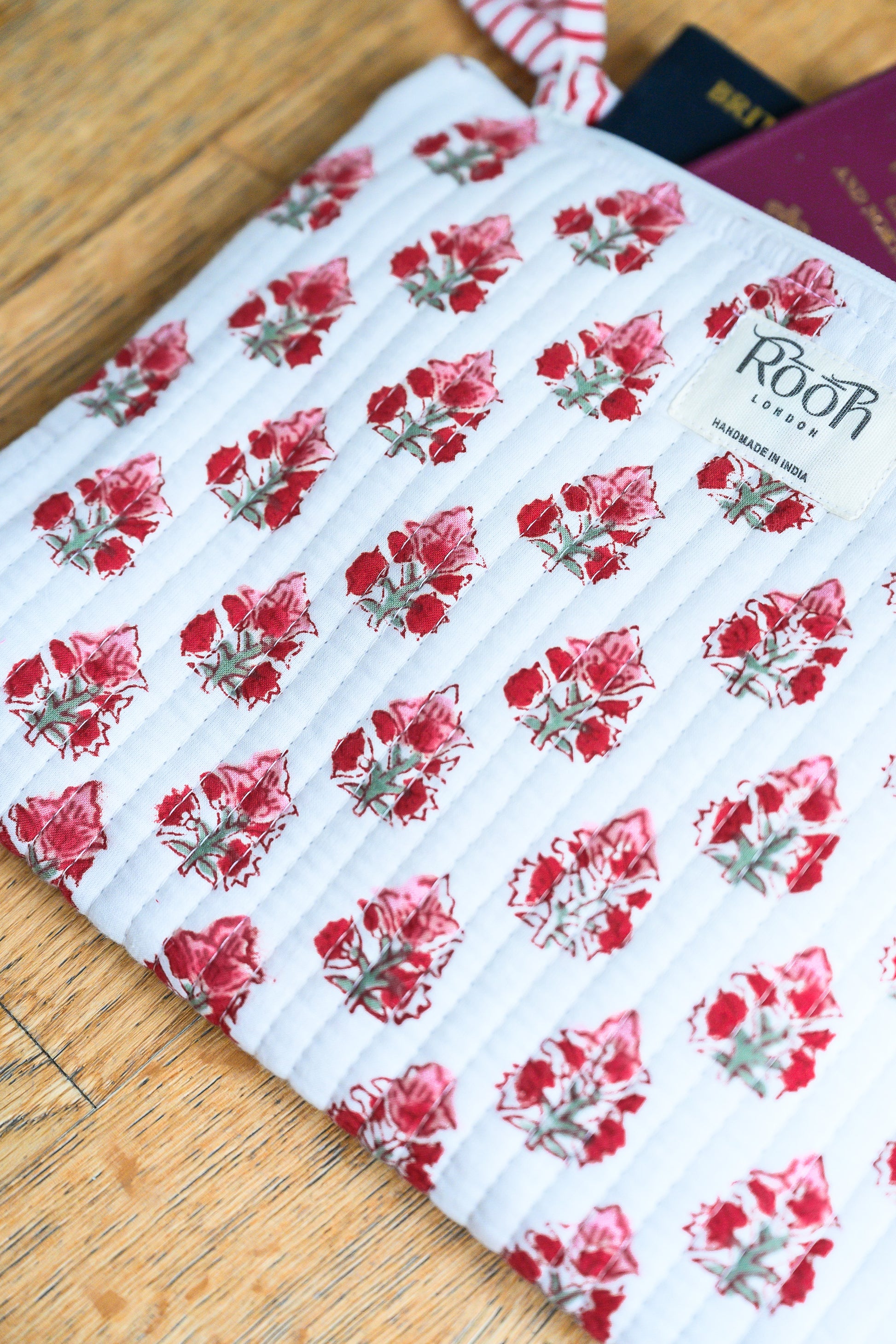 Crimson Bloom quilted makeup and travel pouch trio.