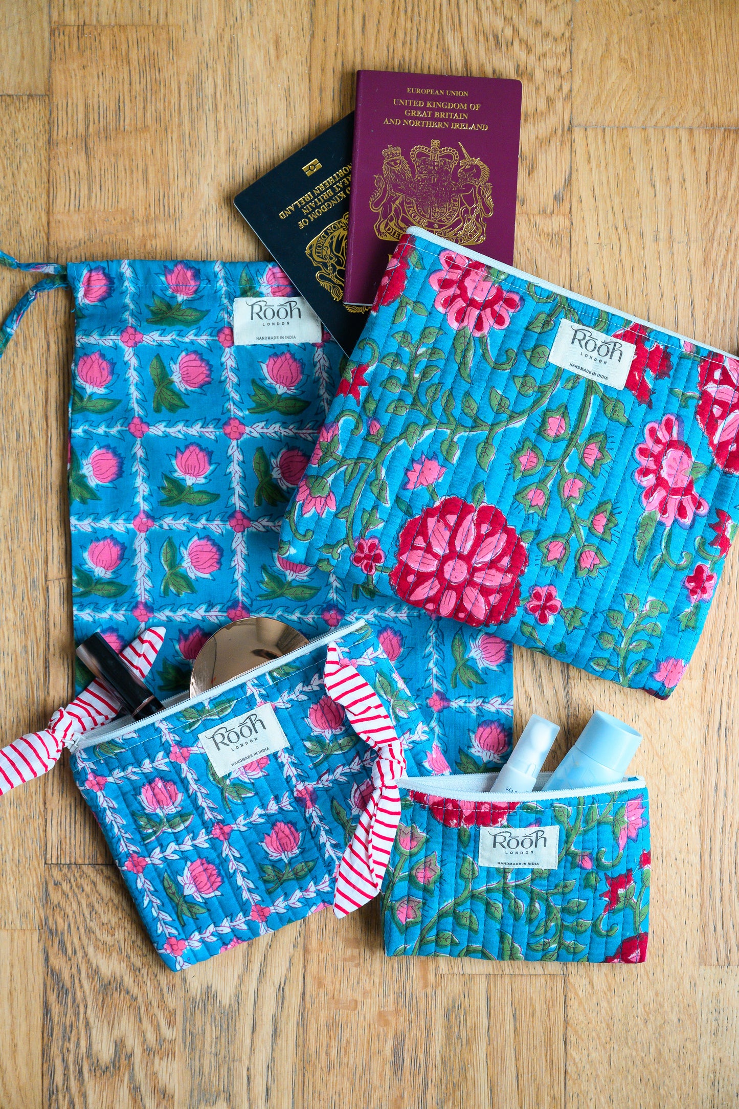 BLUE ROSETTE QUILTED TRAVEL & COSMETIC POUCH SET