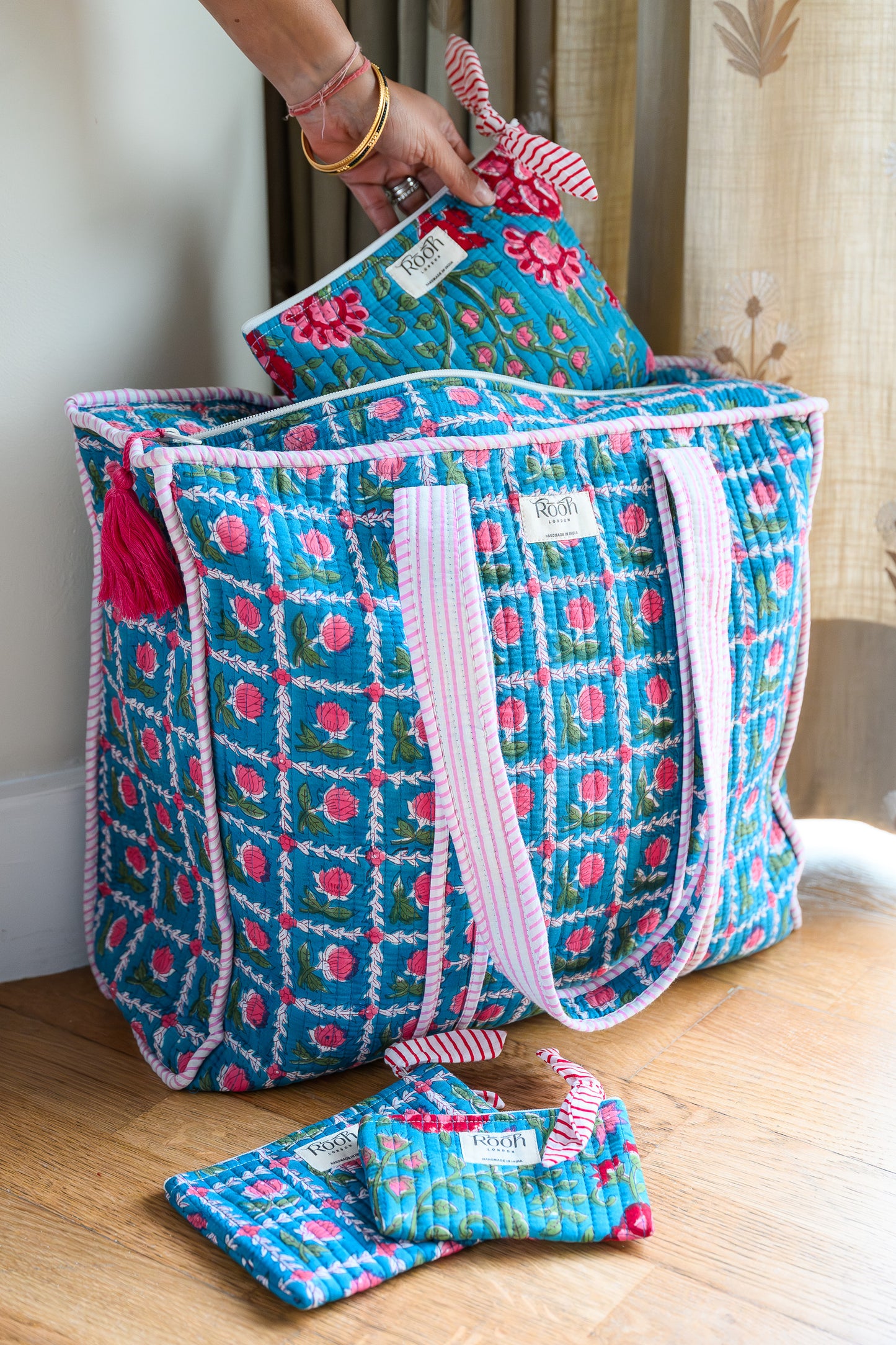 BLUE ROSETTE QUILTED TRAVEL & COSMETIC POUCH SET